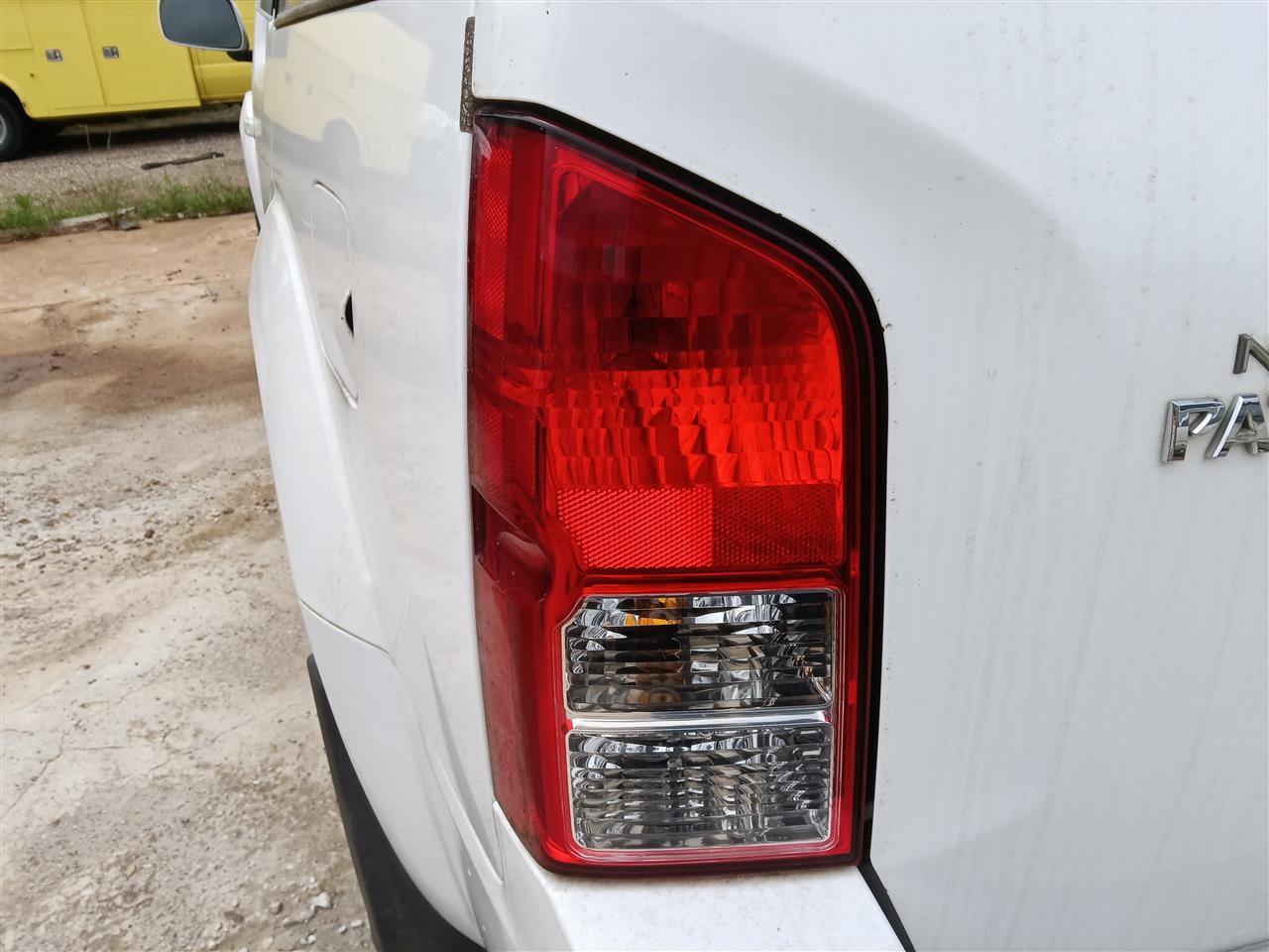 2005 thru 2012 Nissan Pathfinder Driver Side Left Tail Light Lamp Assembly quarter mounted L