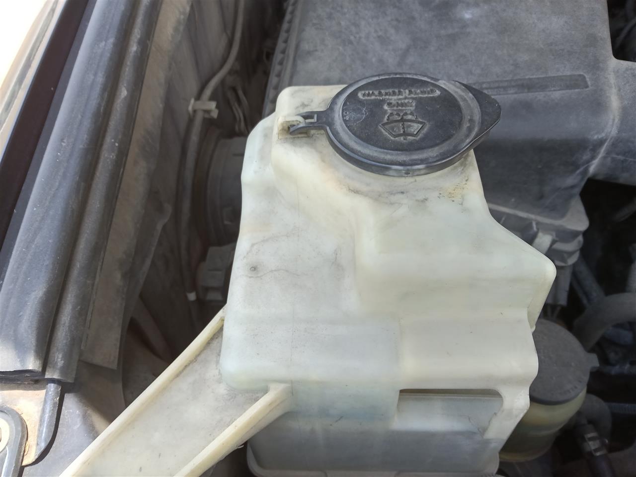 2007 thru 2021 Toyota Tundra Wash Reservoir Assembly