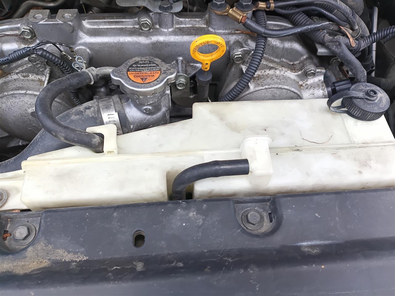 2007 thru 2015 Infiniti G37, Nissan 370Z, Infiniti G35, Infiniti G25 and 2 more Coolant Overflow Reservoir Tank