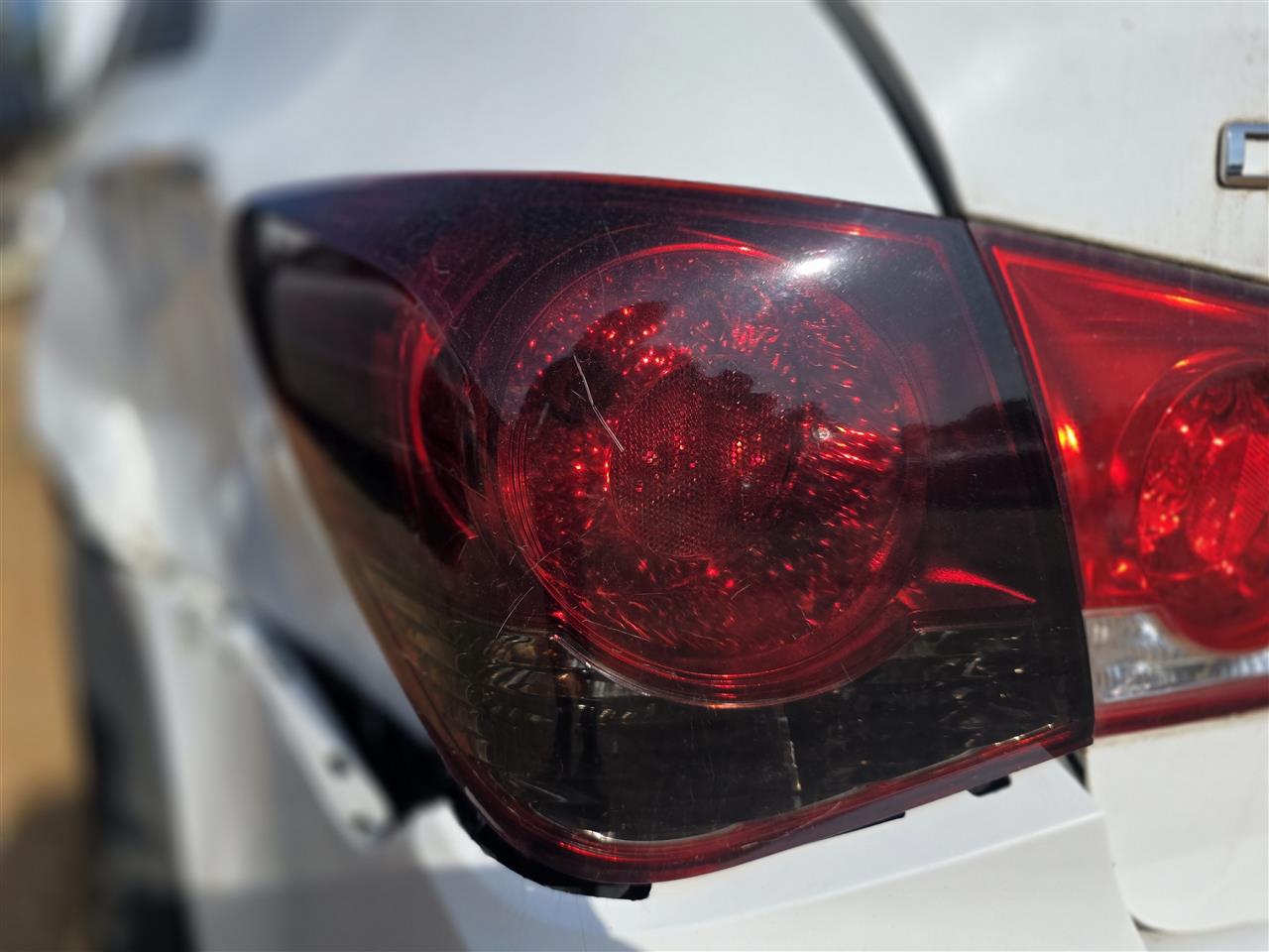 2011 thru 2016 Chevrolet Cruze Driver Side Left Tail Light Lamp Assembly quarter panel mounted L