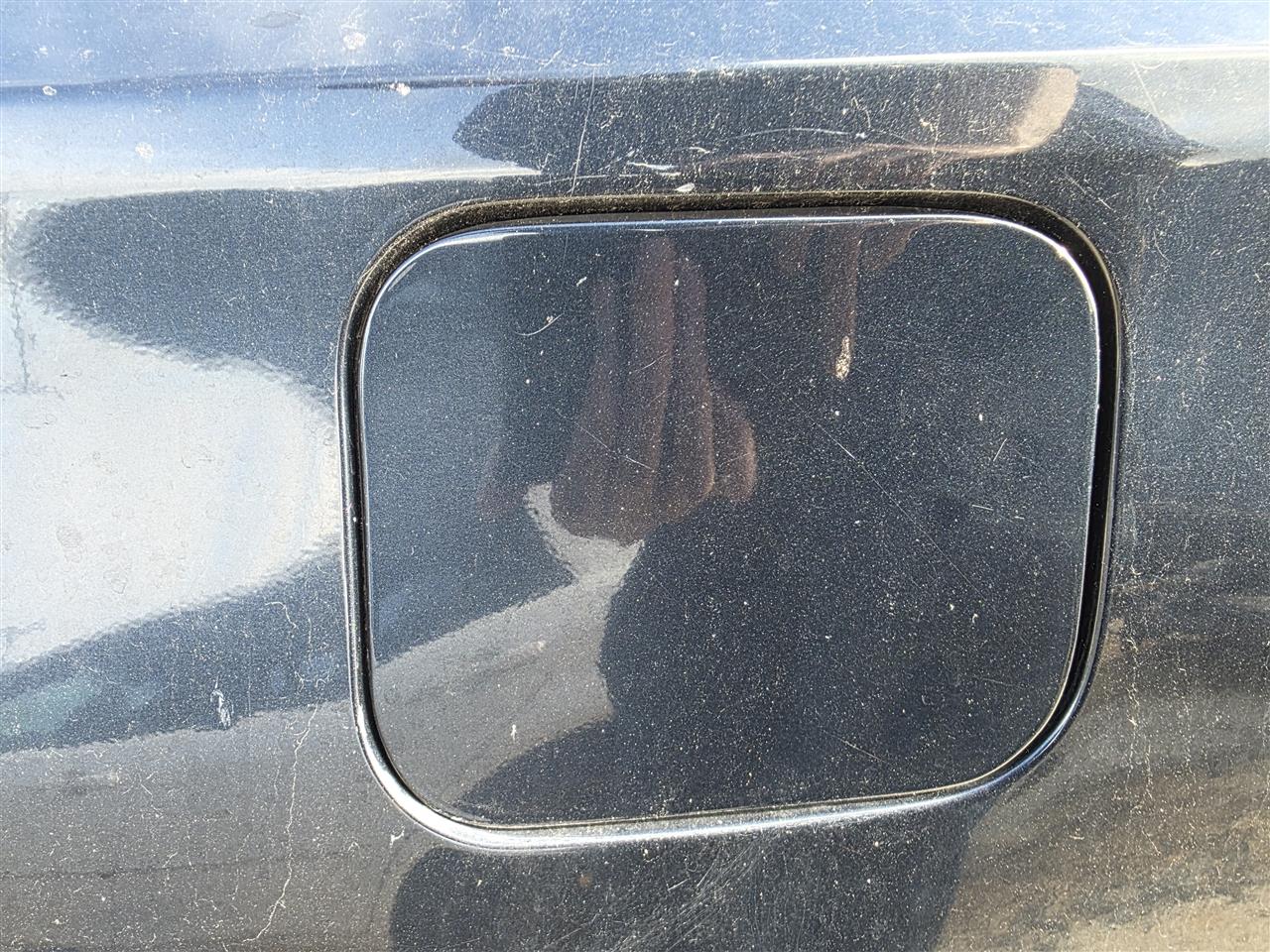 Used OEM Fuel Filler Gas Door Lid from 2015 Toyota Avalon