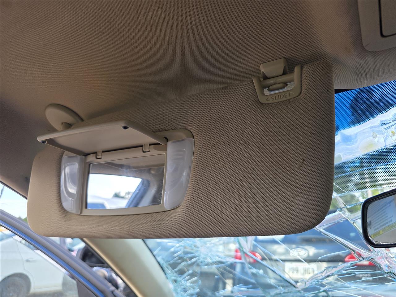 Used OEM Driver Side Left Sun Visor from 2015 Toyota Avalon