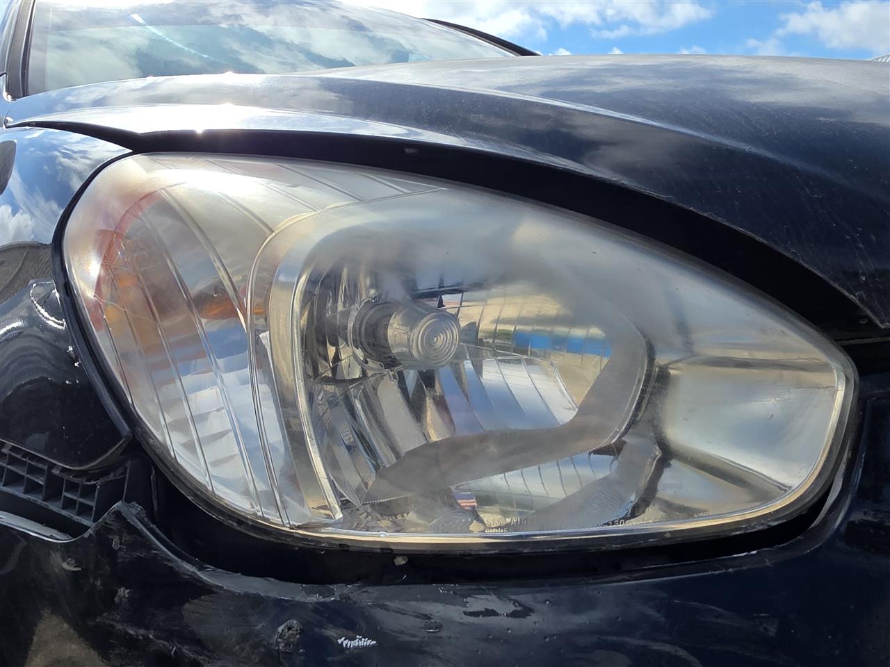 Used OEM Passenger Side Right Headlight Headlamp Assembly from 2010 Hyundai Accent