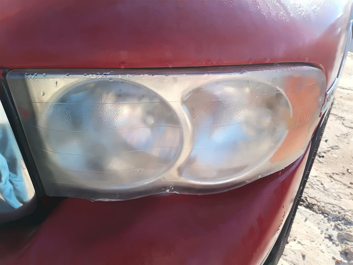 Used OEM Driver Side Left Headlight Headlamp Assembly from 2004 Dodge 1500