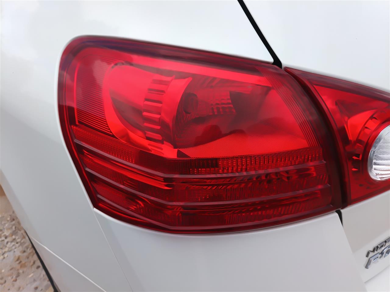 Used OEM Driver Side Left Tail Light Lamp Assembly from 2009 Nissan Rogue