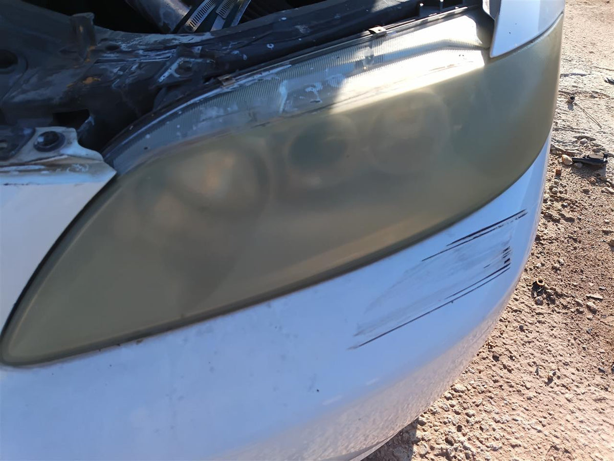 Used OEM Driver Side Left Headlight Headlamp Assembly from 2005 Mazda 6