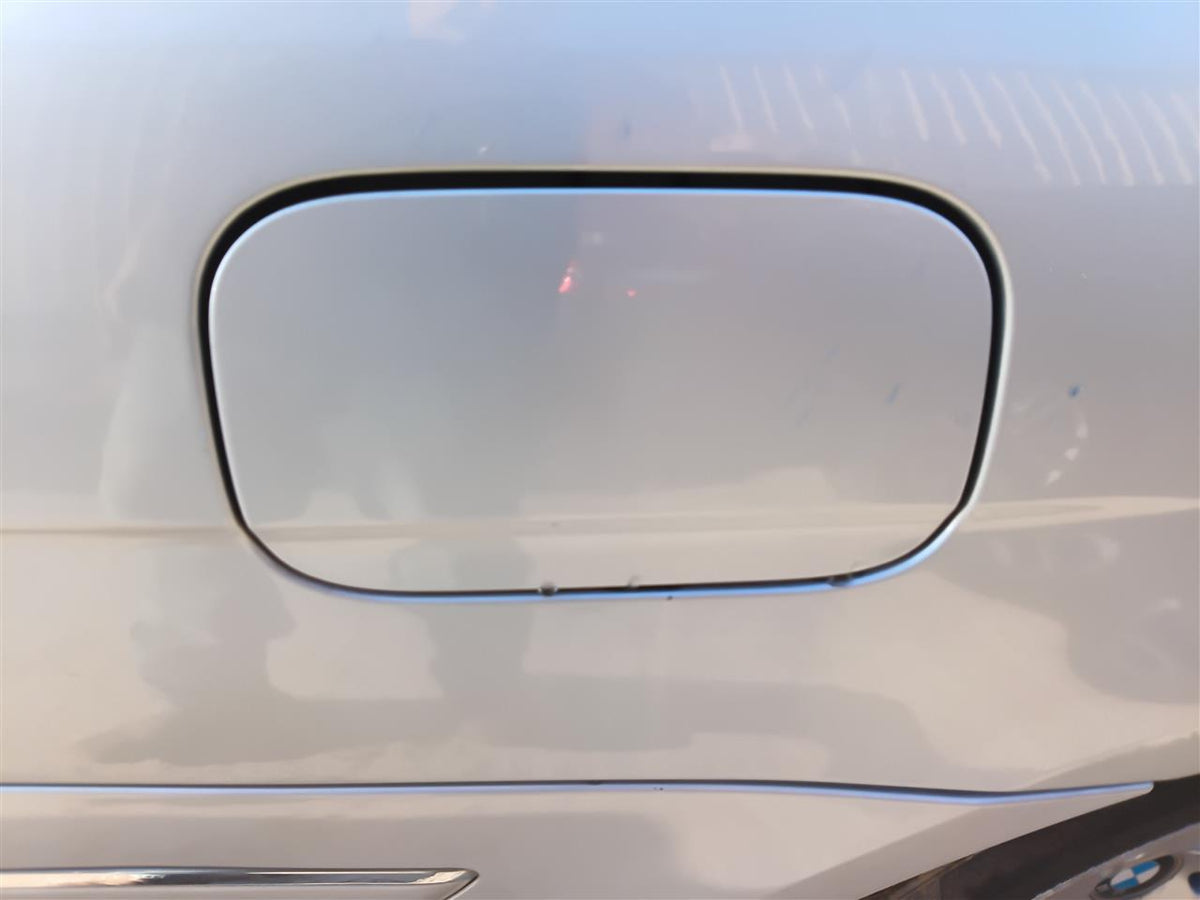Used OEM Fuel Filler Gas Door Lid from 2006 BMW 750I