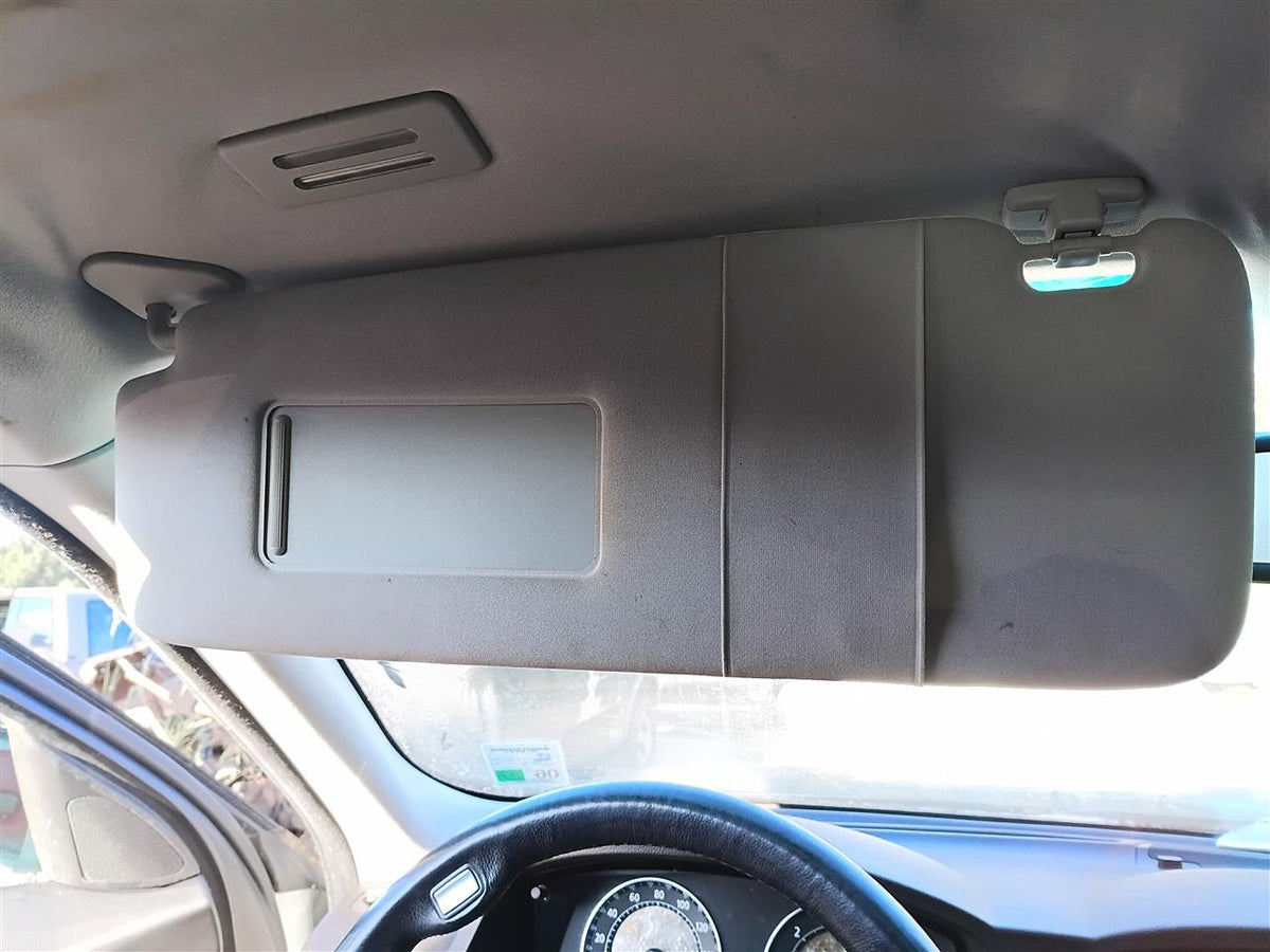 Used OEM Driver Side Left Sun Visor from 2006 BMW 750I