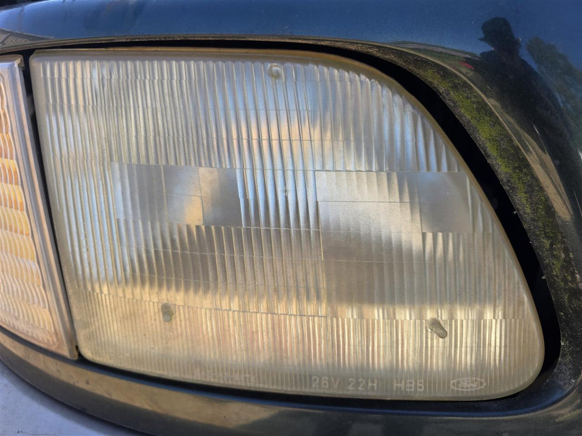 Used OEM Passenger Side Right Headlight Headlamp Assembly from 2002 Ford F150