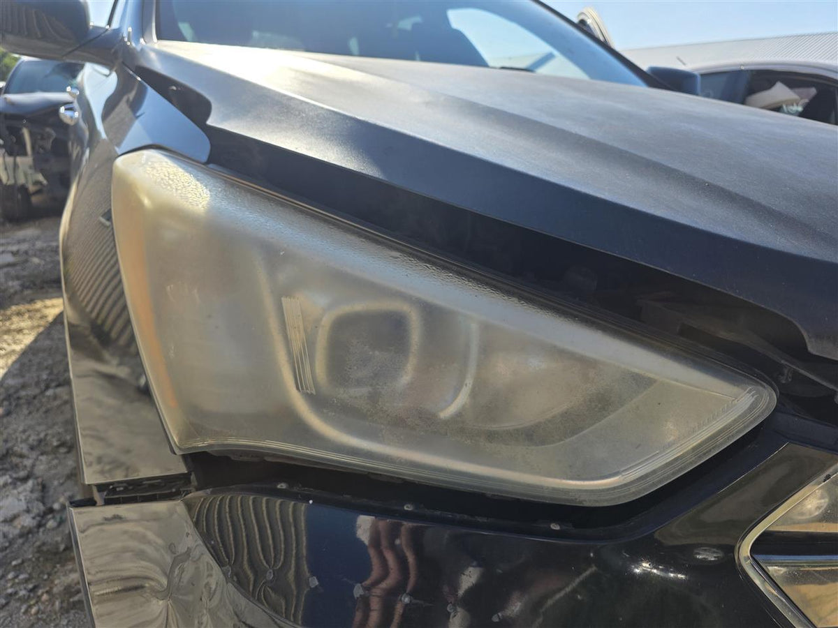 Used OEM Passenger Side Right Headlight Headlamp Assembly from 2013 Hyundai Santa FE