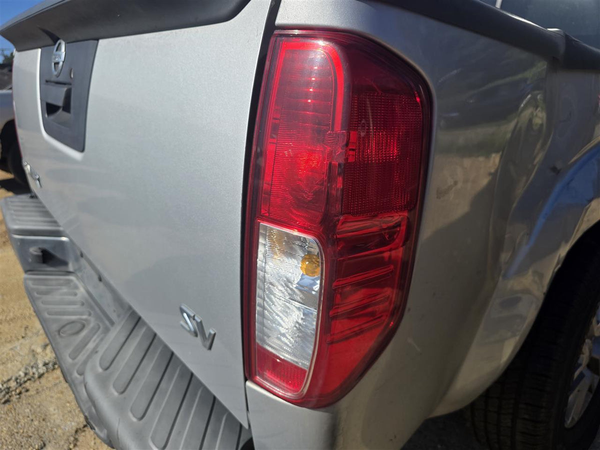 Used OEM Passenger Side Right Tail Light Lamp Assembly from 2014 Nissan Frontier