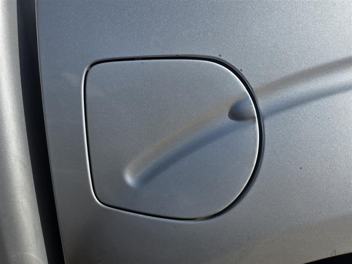 Used OEM Fuel Filler Gas Door Lid from 2014 Nissan Frontier
