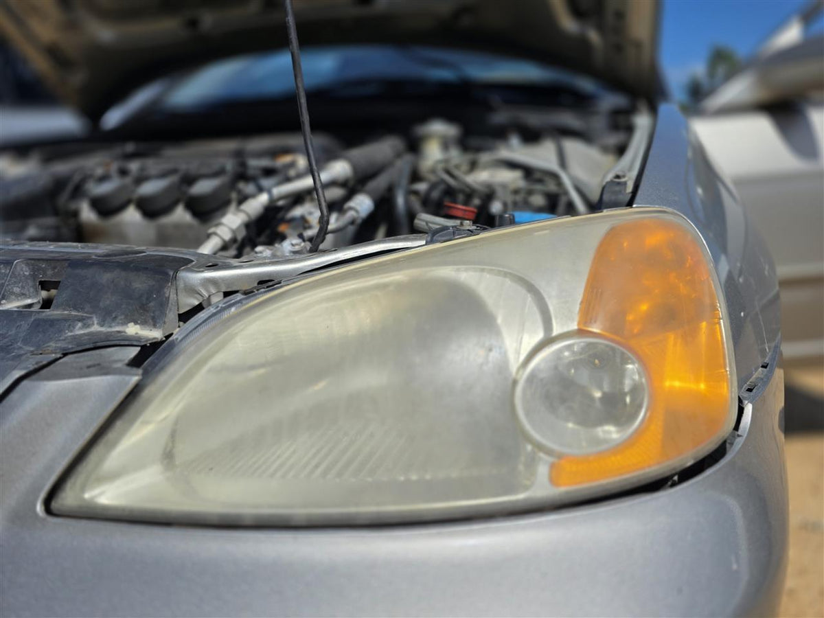 Used OEM Driver Side Left Headlight Headlamp Assembly from 2003 Honda Civic