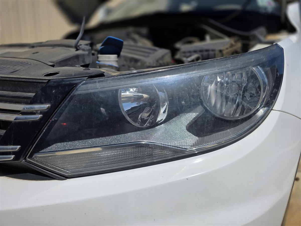 Used OEM Driver Side Left Headlight Headlamp Assembly from 2014 Volkswagen Tiguan