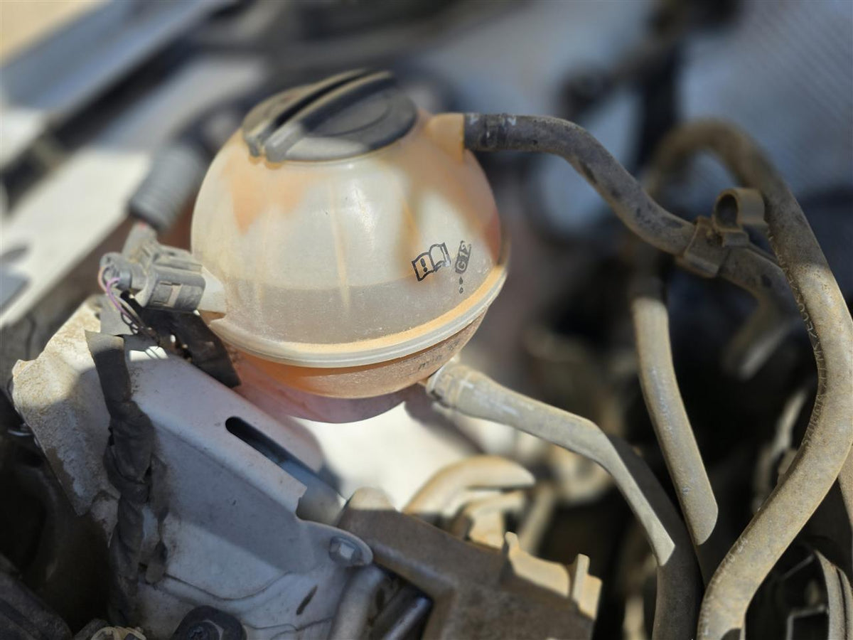 Used OEM Coolant Overflow Reservoir Tank from 2014 Volkswagen Tiguan