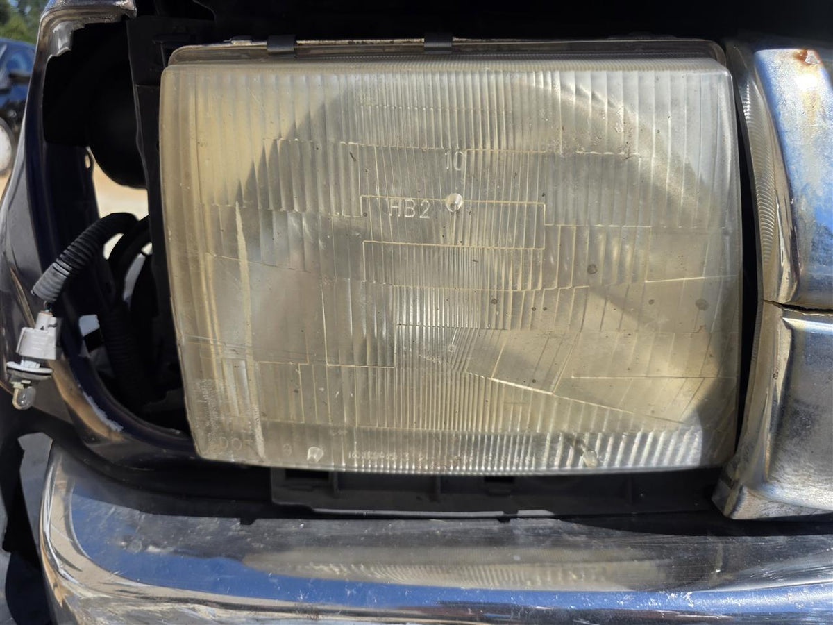 Used OEM Passenger Side Right Headlight Headlamp Assembly from 1999 Toyota Tacoma