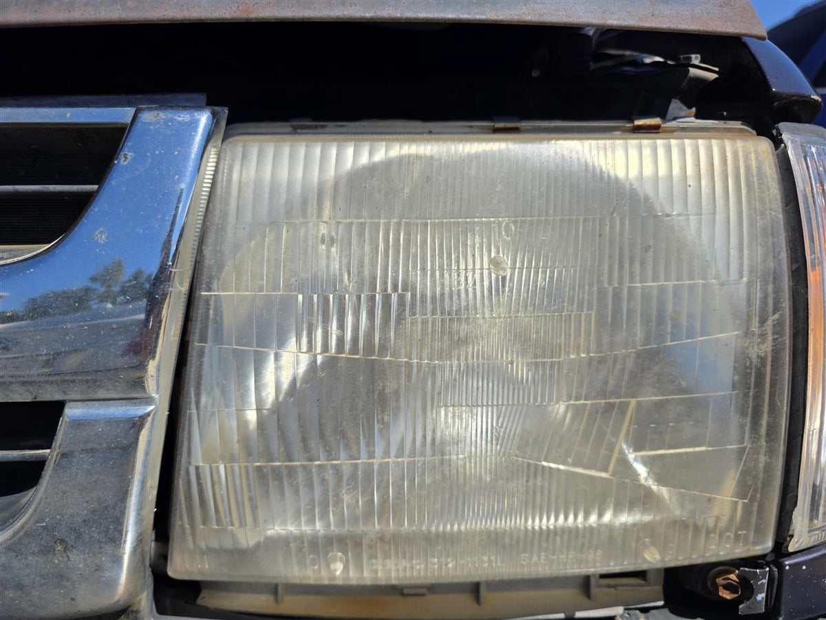 Used OEM Driver Side Left Headlight Headlamp Assembly from 1999 Toyota Tacoma