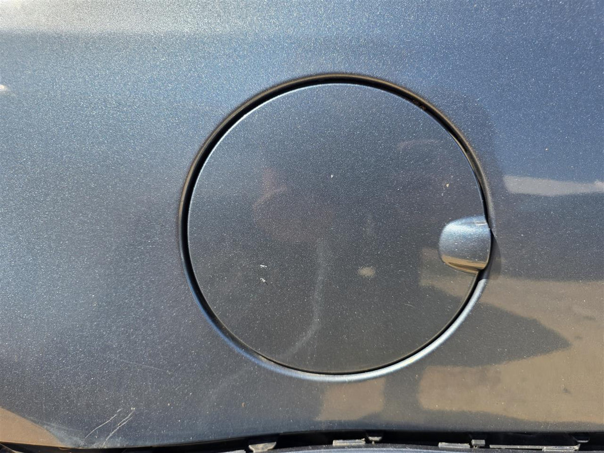 Used OEM Fuel Filler Gas Door Lid from 2011 Ford Fusion