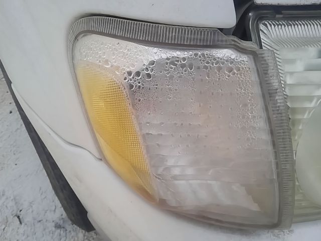 2001 thru 2005 Ford Explorer Passenger Side Right Front Lamp Park Turn Signal outer headlamp mounted R