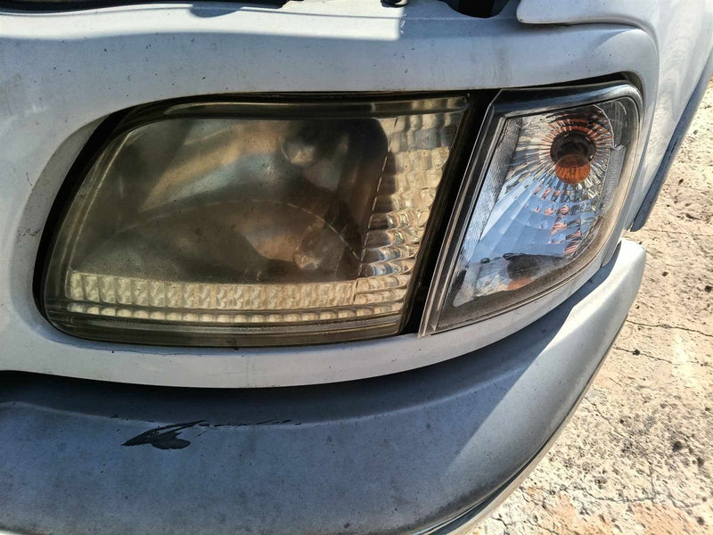 1997 thru 2004 Ford F150, Ford Expedition, Ford F250 Driver Side Left Headlight Headlamp Assembly L