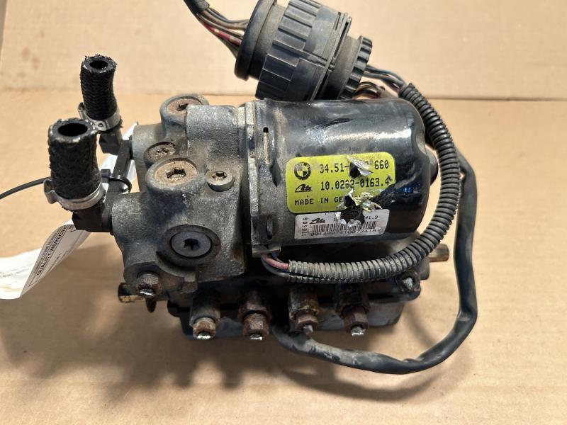 1993 thru 1997 BMW 325I, BMW 318I, BMW 328I ABS Anti Lock Brake Pump Control Module Assembly with traction