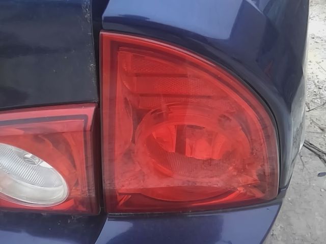 2008 thru 2012 Chevrolet Malibu Passenger Side Right Tail Light Lamp Assembly quarter panel mounted red lens R
