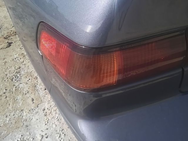 1997 1998 1999 Toyota Camry Driver Side Left Tail Light Lamp Assembly quarter panel mounted