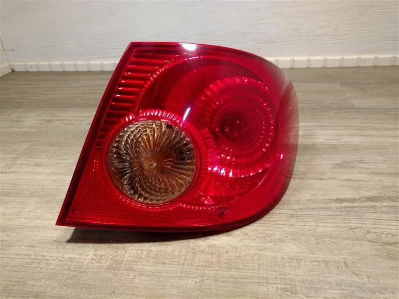 2003 thru 2008 Toyota Corolla Passenger Side Right Tail Light Lamp Assembly quarter panel mounted R