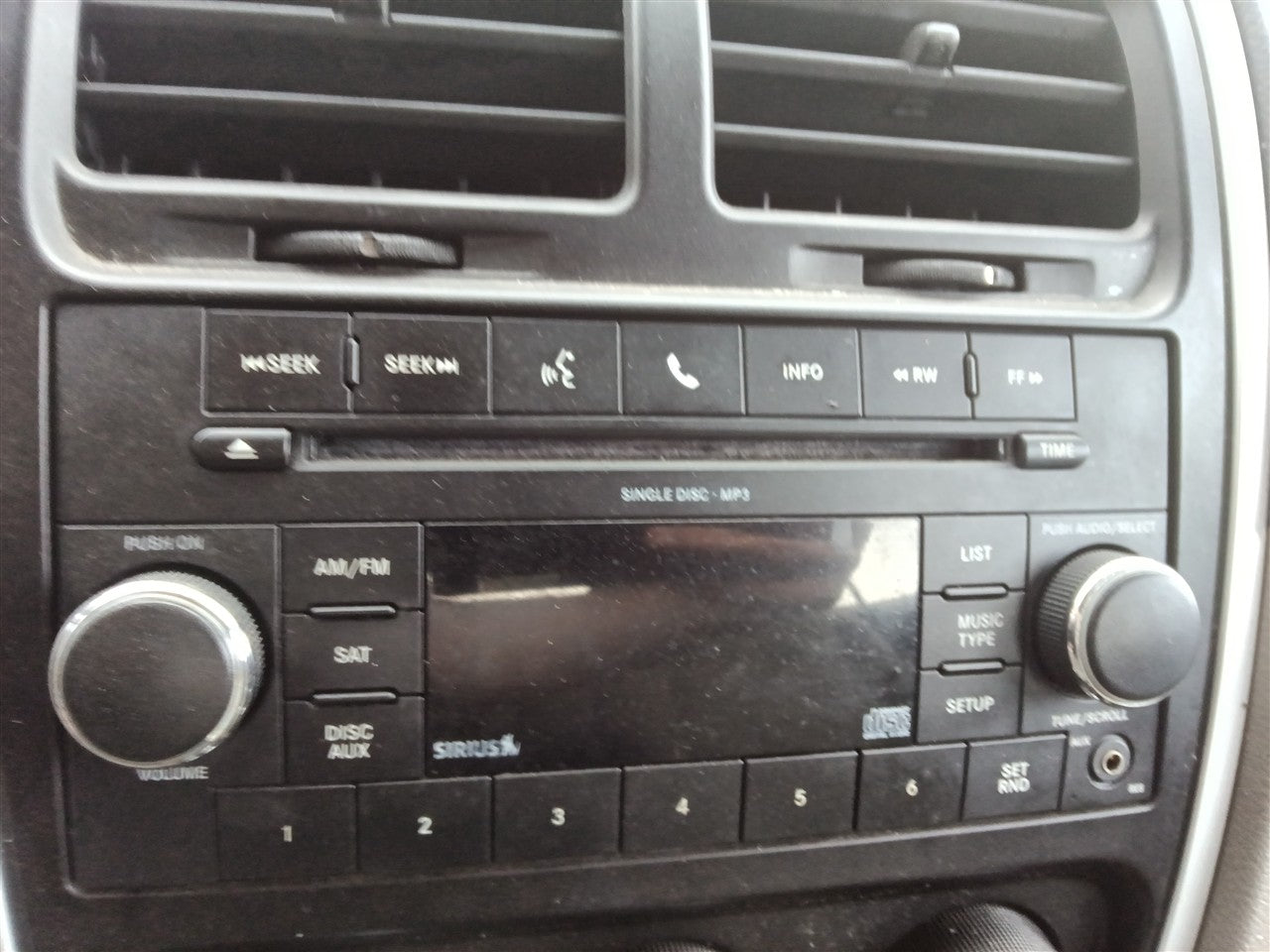 2010 Dodge Caliber Radio Stereo Audio Head Unit receiver ID RES on face plate with satellite