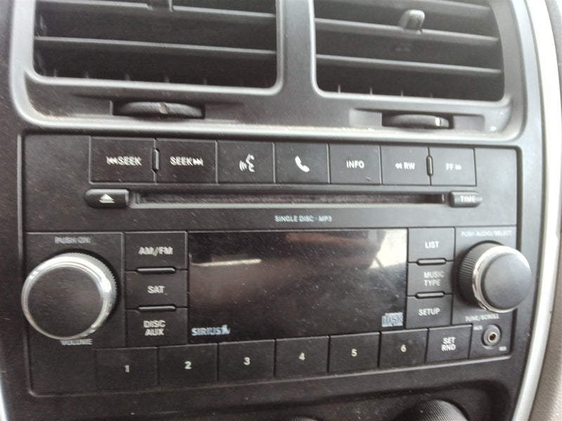 2010 Dodge Caliber Radio Stereo Audio Head Unit receiver ID RES on face plate with satellite