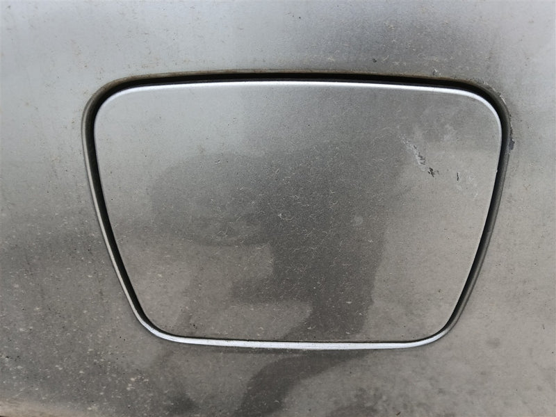 Used OEM Fuel Filler Gas Door Lid from 2007 Kia