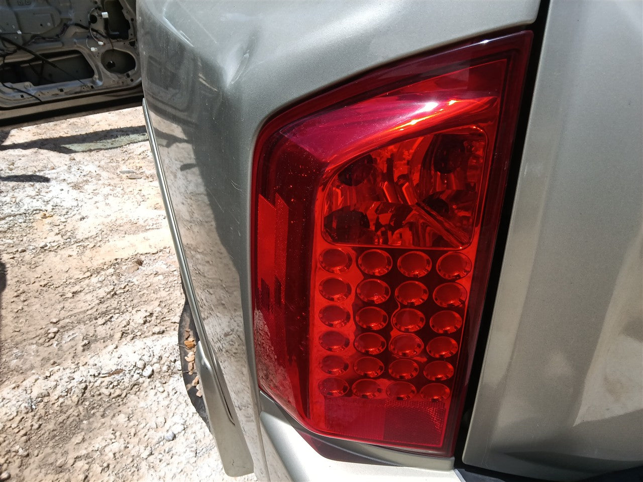 2004 thru 2010 Infiniti QX56 Driver Side Left Tail Light Lamp Assembly L