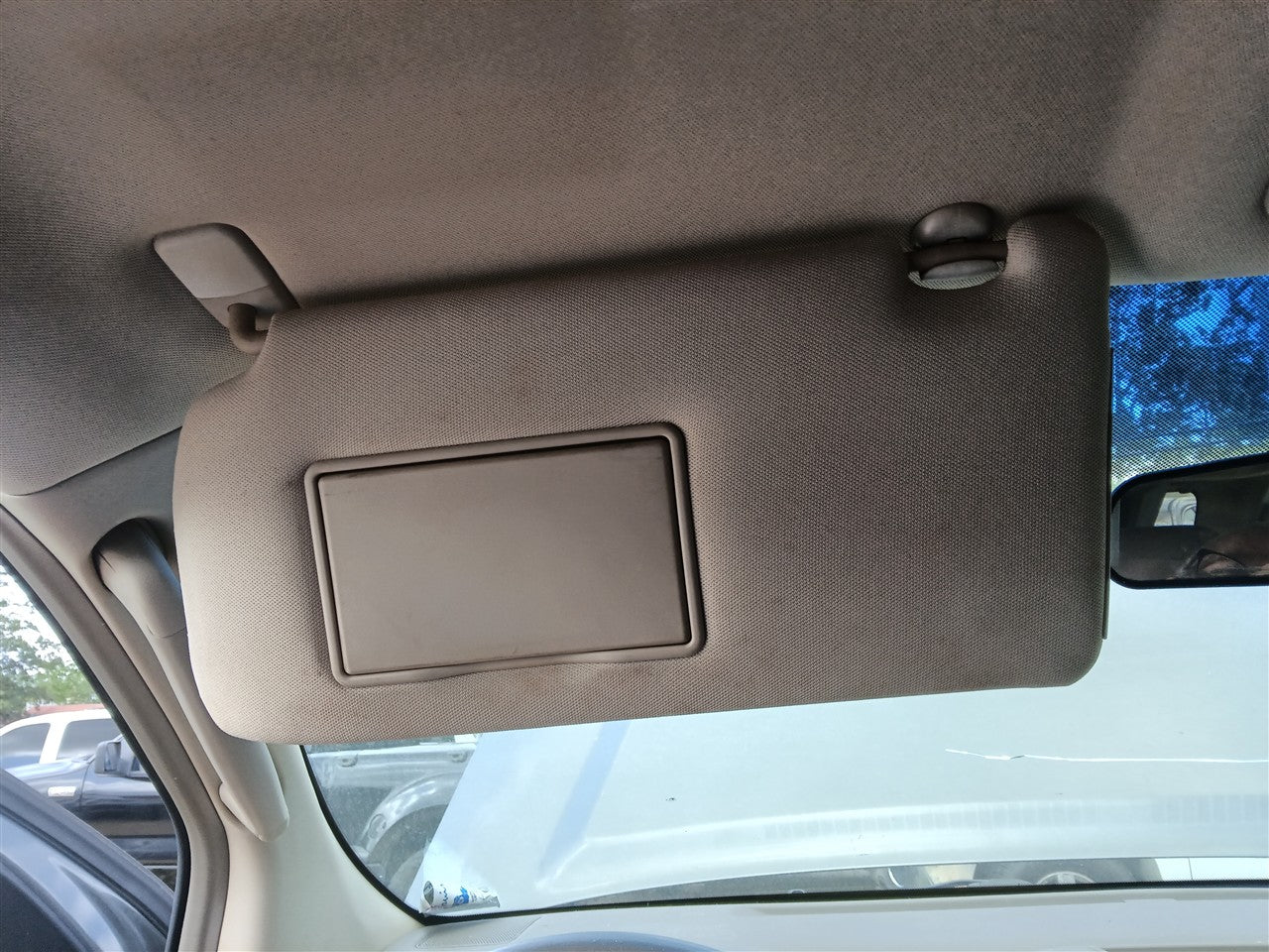 2005 thru 2012 Nissan Pathfinder Driver Side Left Sun Visor without illumination 4x2 L