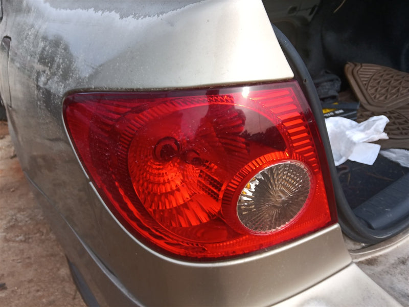 2003 thru 2008 Toyota Corolla Driver Side Left Tail Light Lamp Assembly quarter panel mounted L