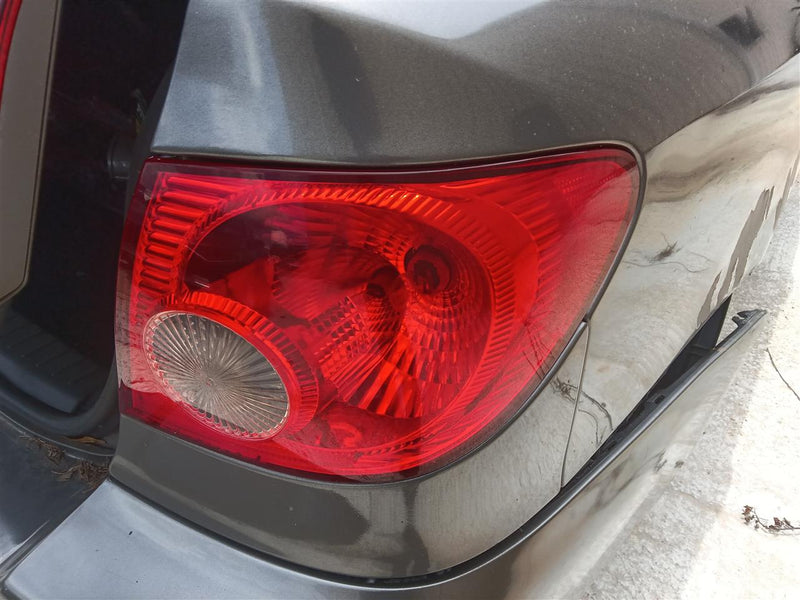 2003 thru 2008 Toyota Corolla Passenger Side Right Tail Light Lamp Assembly quarter panel mounted R