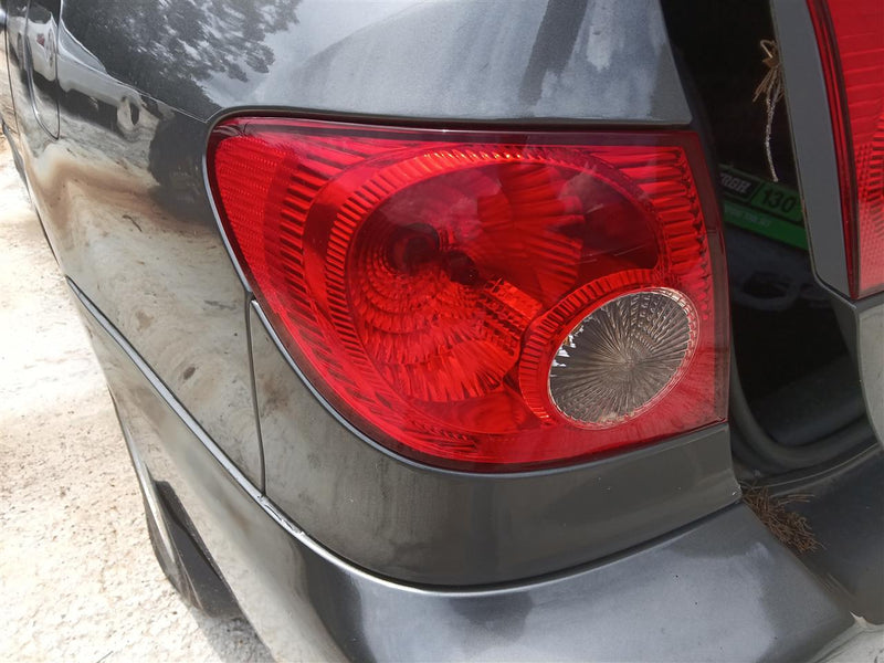 2003 thru 2008 Toyota Corolla Driver Side Left Tail Light Lamp Assembly quarter panel mounted L