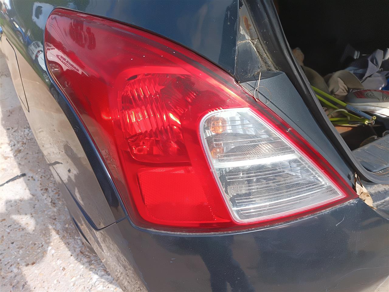 2012 thru 2019 Nissan Versa Driver Side Left Tail Light Lamp Assembly quarter panel mounted L