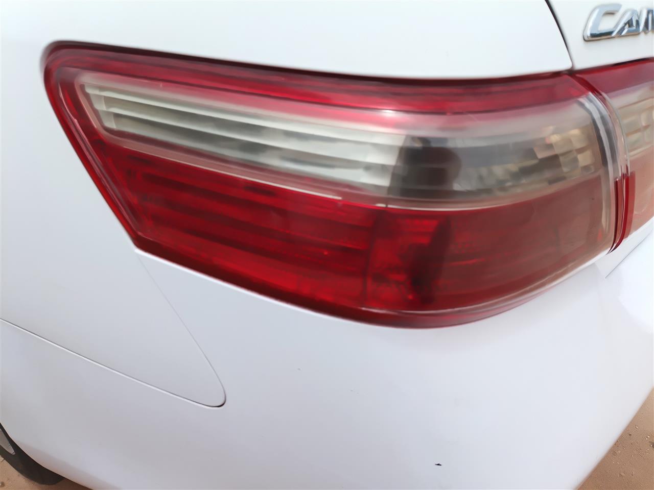 2007 2008 2009 Toyota Camry Driver Side Left Tail Light Lamp Assembly quarter panel mounted L without red outline