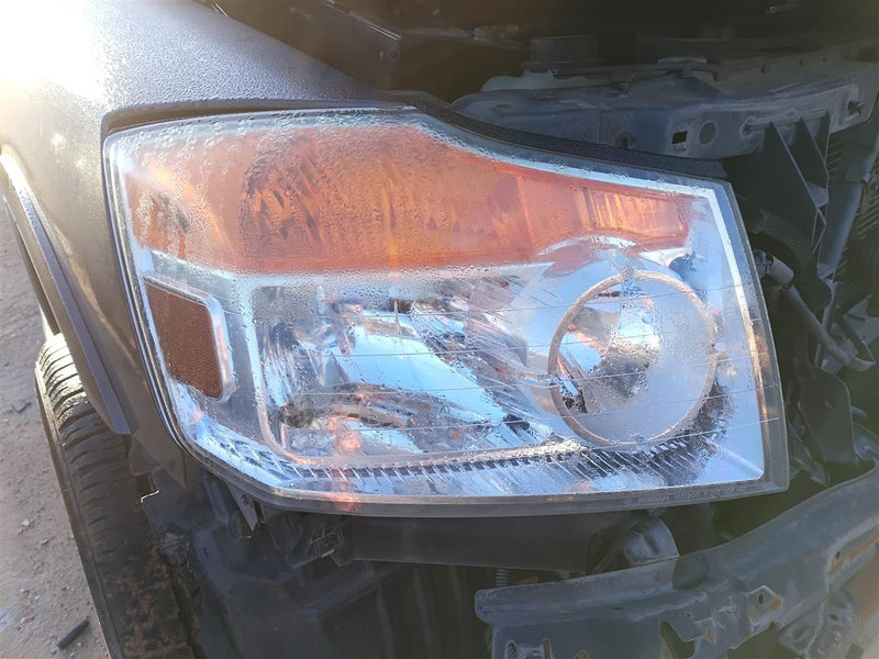 Used OEM Passenger Side Right Headlight Headlamp Assembly from 2014 Nissan Armada
