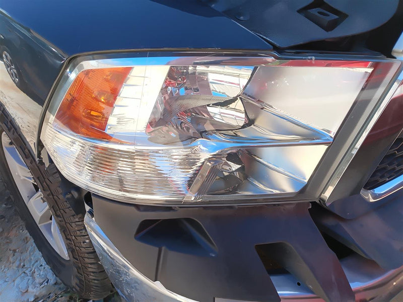 Used OEM Passenger Side Right Headlight Headlamp Assembly from 2018 Dodge 1500