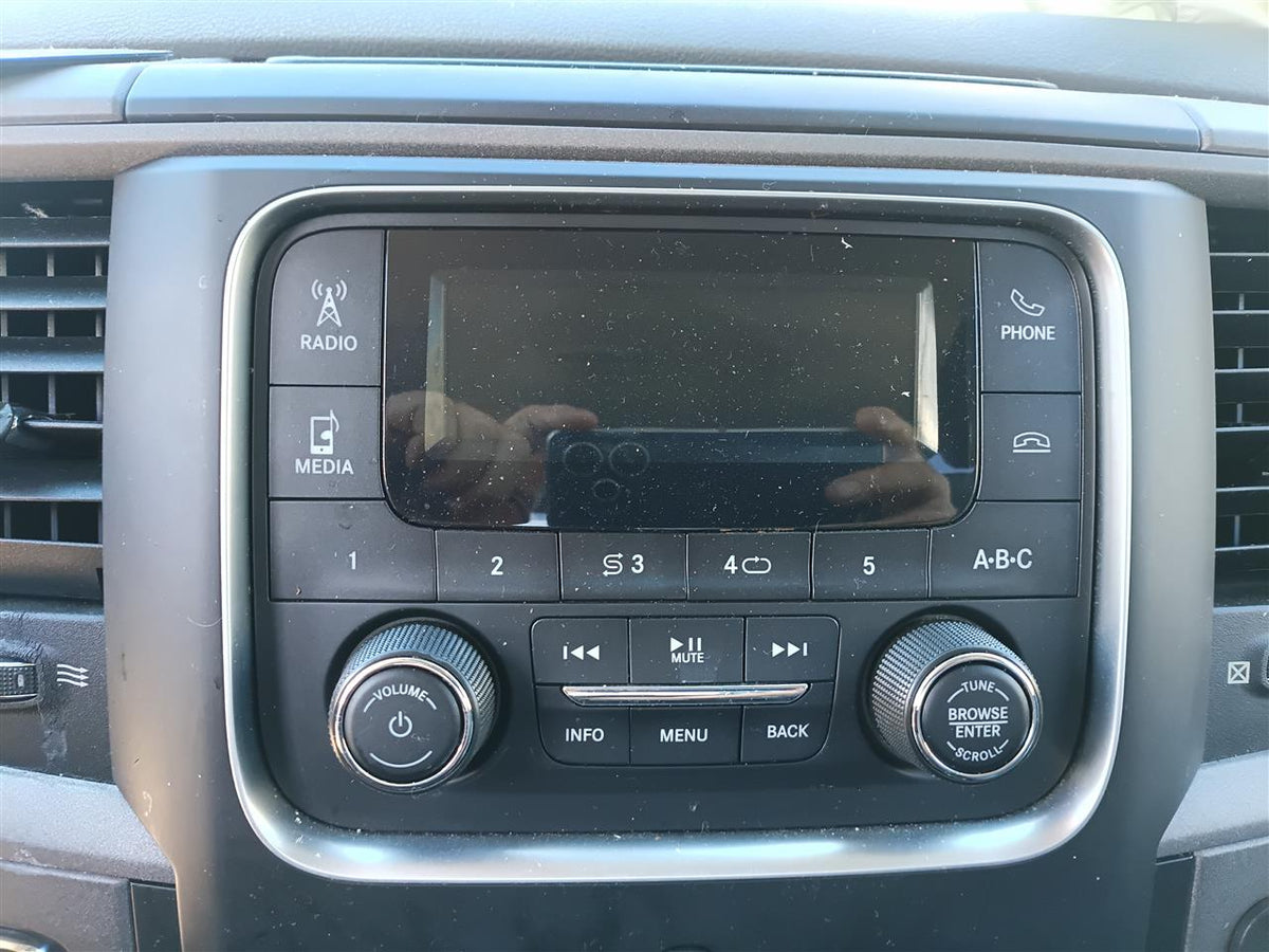 Used OEM Radio Stereo Audio Head Unit from 2018 Dodge 1500