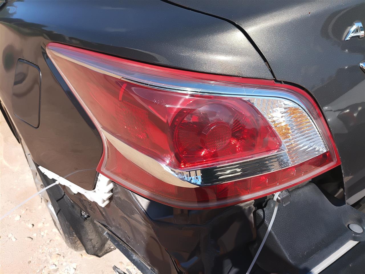 Used OEM Driver Side Left Tail Light Lamp Assembly from 2013 Nissan Altima