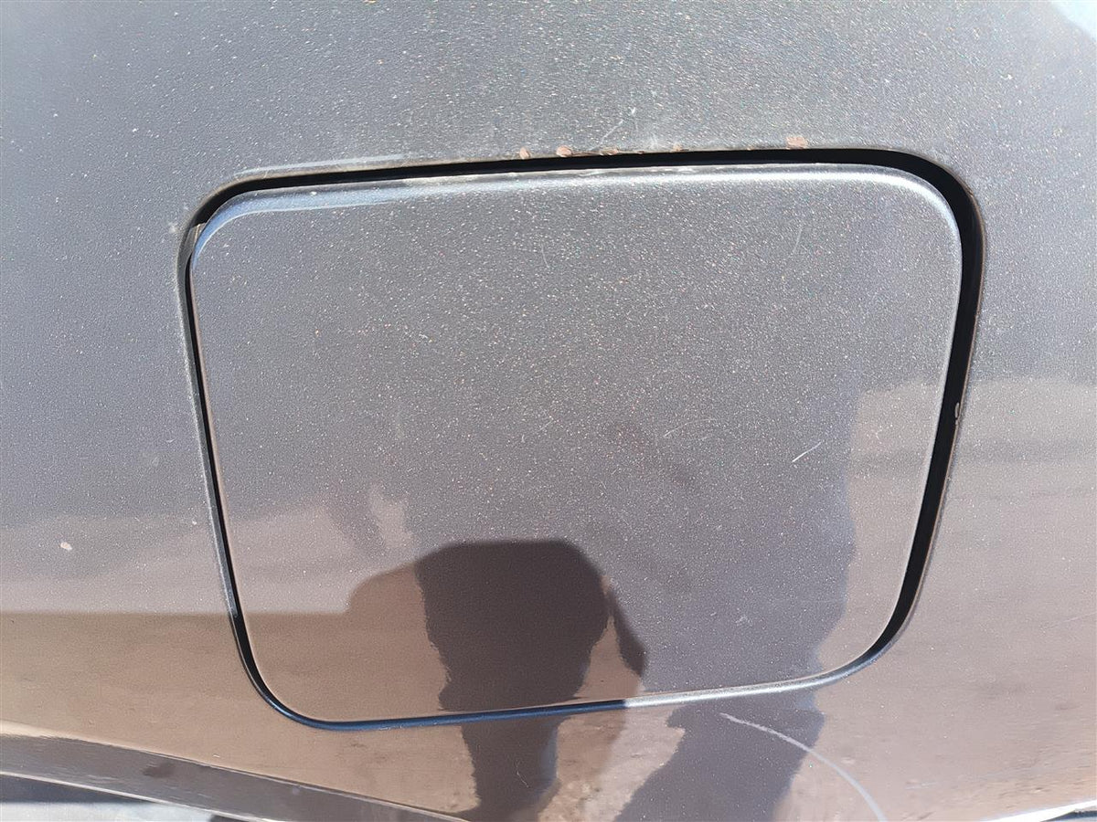 Used OEM Fuel Filler Gas Door Lid from 2013 Nissan Altima