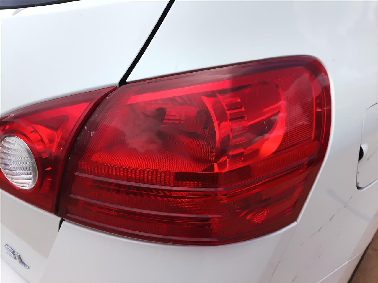 Used OEM Passenger Side Right Tail Light Lamp Assembly from 2009 Nissan Rogue