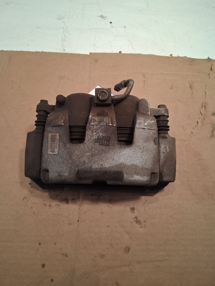 Used OEM Driver Side Left Caliper from 2018 Dodge 1500
