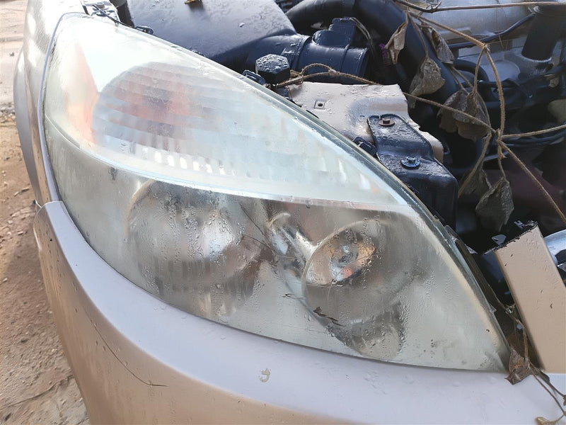 Used OEM Passenger Side Right Headlight Headlamp Assembly from 2007 Saturn Aura