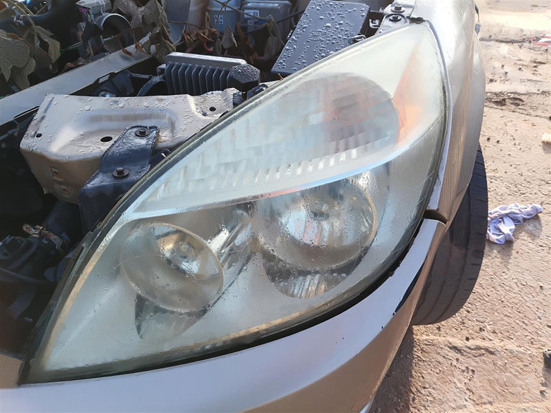 Used OEM Driver Side Left Headlight Headlamp Assembly from 2007 Saturn Aura