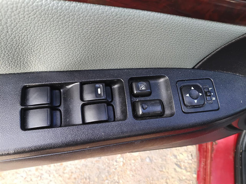 Used OEM Driver Side Left Front Door Window Master Switch from 2009 Mitsubishi Galant