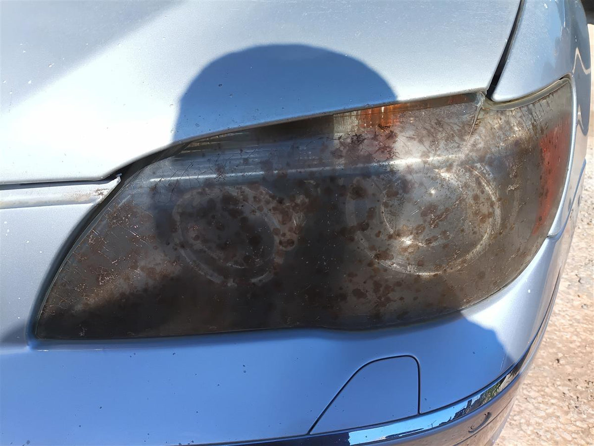 Used OEM Driver Side Left Headlight Headlamp Assembly from 2006 BMW 750I