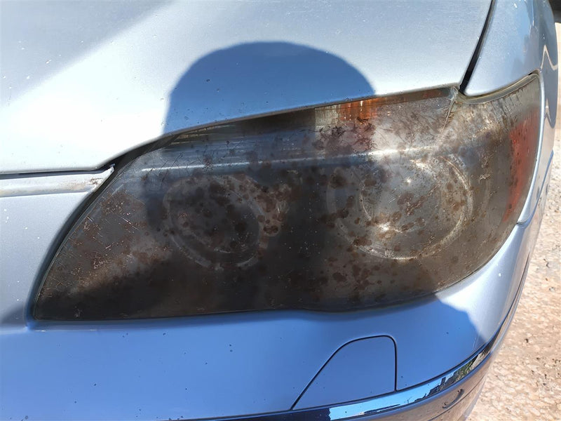 Used OEM Driver Side Left Headlight Headlamp Assembly from 2006 BMW 750I